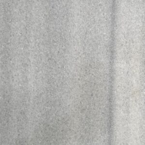 Close-up of Maya Blue Marble paver with fine texture and soft grey-blue shading.