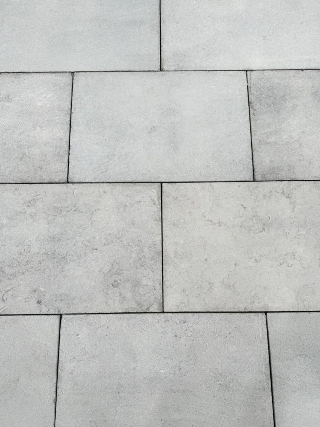 Loch Limestone pavers in a staggered light grey pattern. Loch Limestone pavers in a staggered light grey pattern. Ask ChatGPT