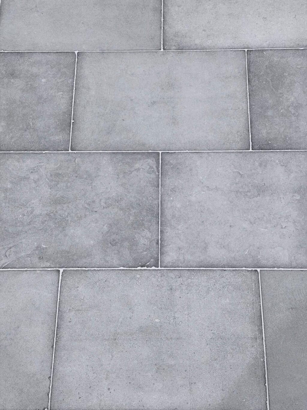 Loch Limestone paver in a soft grey tone with a smooth, sandblasted finish and subtle surface texture.