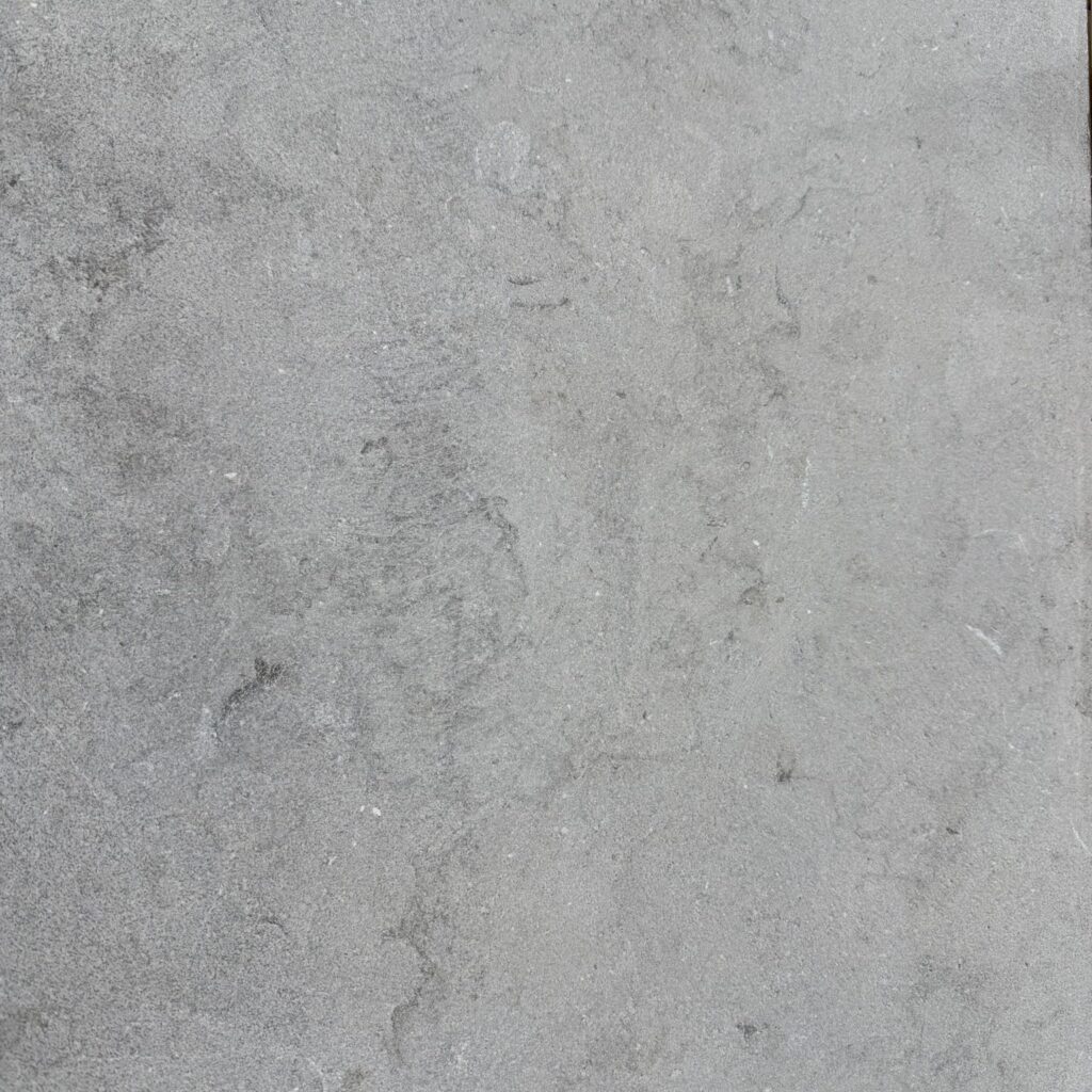 Loch Limestone paver with a textured light grey surface.