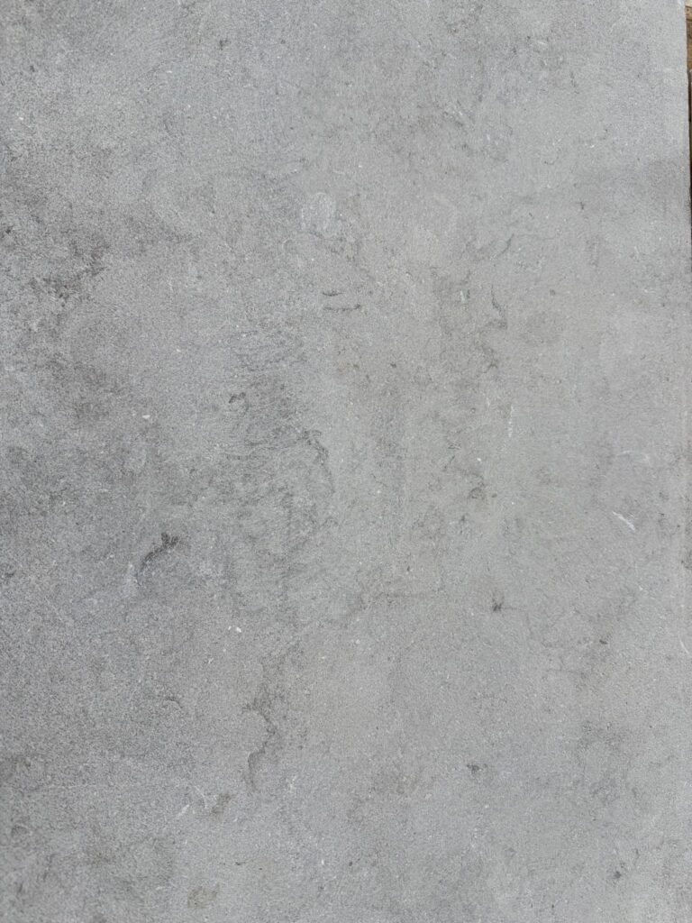 Loch Limestone paver with a textured light grey surface.