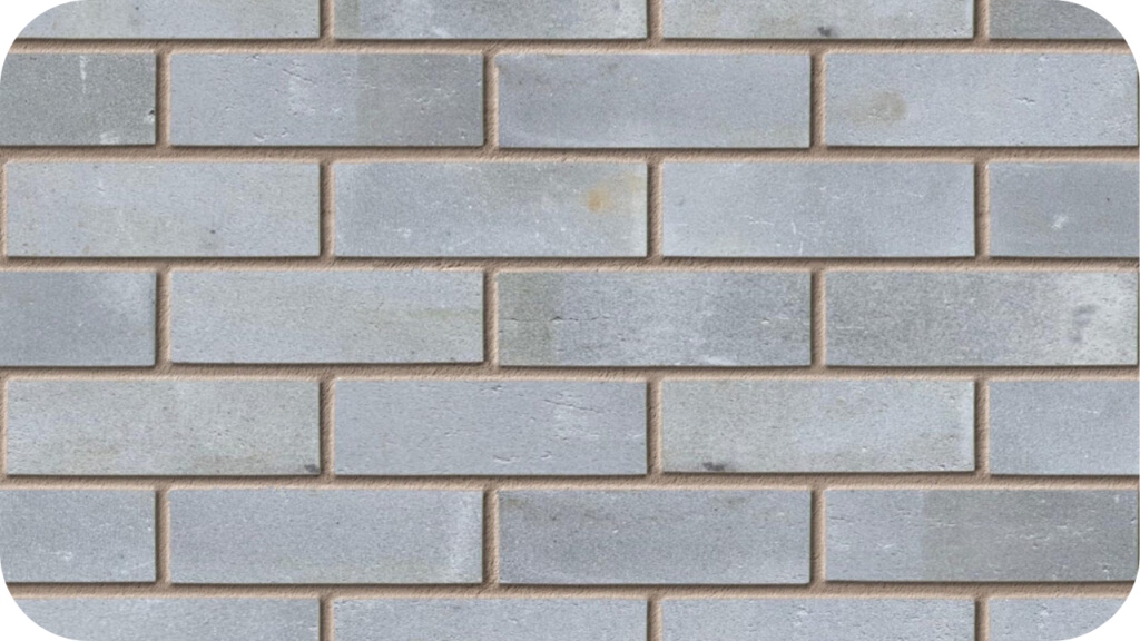 Close-up view of Ashbury brick wall with smooth grey tones and subtle texture, perfect for stylish contemporary wall design projects.